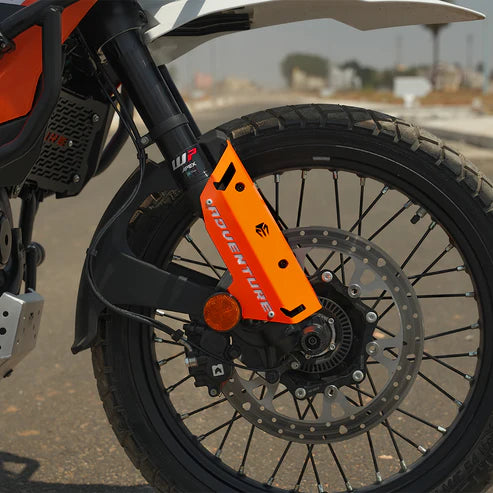 FORK PROTECTORS METAL - ORANGE FOR 2025 FOR KTM 390 Adventure/Adventure X